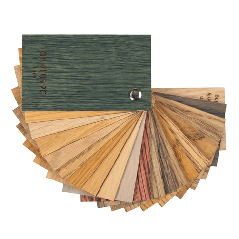 Wood sample swatch book with Rubio Monocoat 2C Oil colors applied to white oak, pictured on a white background