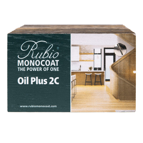 Rubio Monocoat Oil Plus 2C packaging with a kitchen scene on a white background