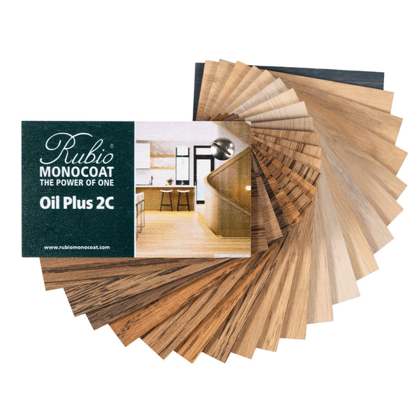 Rubio Monocoat Oil Plus 2C color swatch book with wooden finish samples on a white background